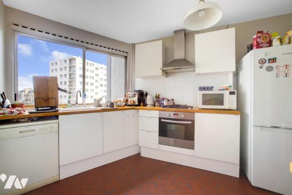 T2 lumineux Paris 15 – 7e étage, ascenseur, entre Seine & métro