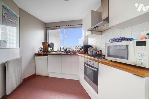 T2 lumineux Paris 15 – 7e étage, ascenseur, entre Seine & métro