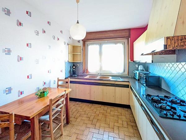 Plain-pied sur sous-sol F5 avec jardin