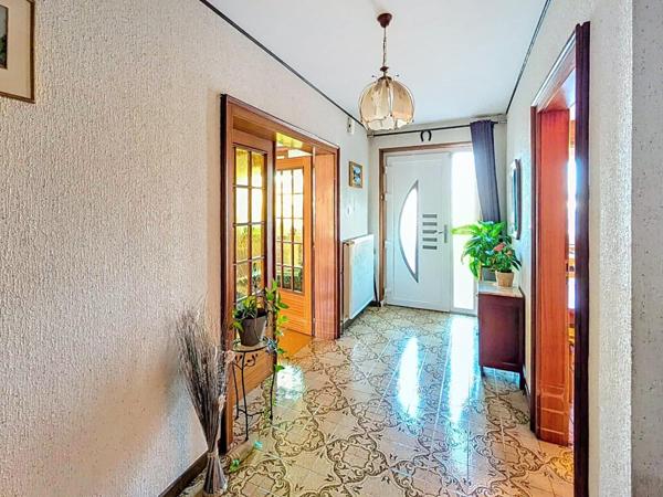 Plain-pied sur sous-sol F5 avec jardin