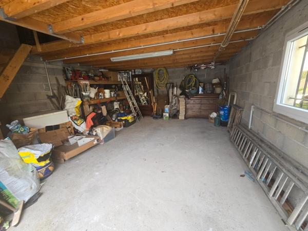 Maison avec jardin et garage rénové proche des commodités