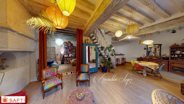 Maison de ville avec jardin et place de parking couverte