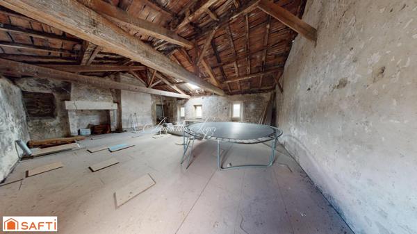 Maison de ville avec jardin et place de parking couverte