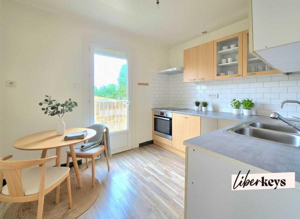 Appartement T5 avec balcon et place de parking