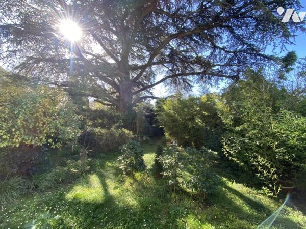 Appartement T4, en rez-de-jardin avec 250 m² de jardin et parking privatif