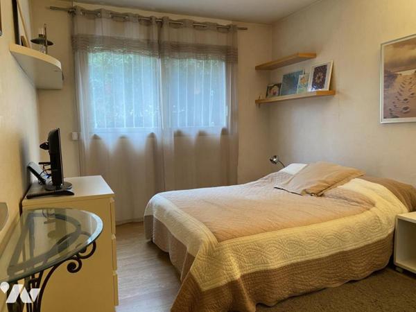 Appartement T4, en rez-de-jardin avec 250 m² de jardin et parking privatif