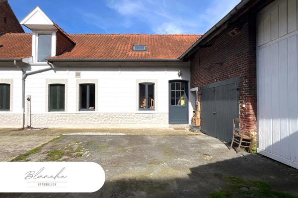 Ferme au carré avec potentiel et cachet en campagne péveloise