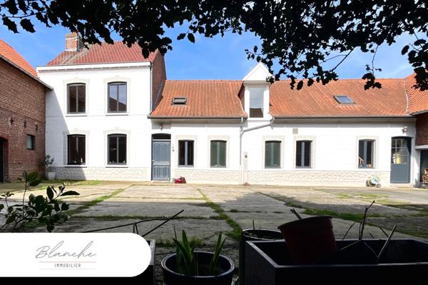 Ferme au carré avec potentiel et cachet en campagne péveloise