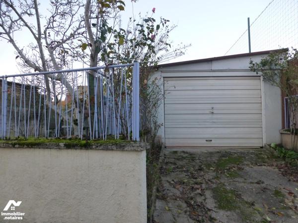 Maison avec jardin et garage