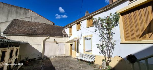 Ancien corps de ferme à rénover au coeur du village