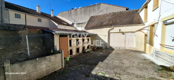 Ancien corps de ferme à rénover au coeur du village