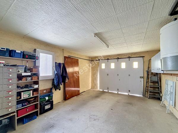 Maison familiale à vendre à Ancenis-Saint-Géréon - 5 chambres, jardin et garage.