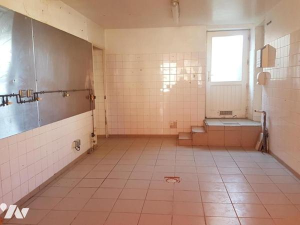 Immeuble à usage de commerce et/ou d'habitation proche centre-ville