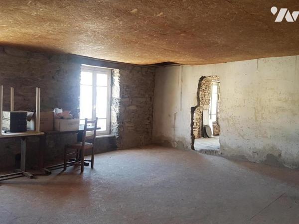 Immeuble à usage de commerce et/ou d'habitation proche centre-ville