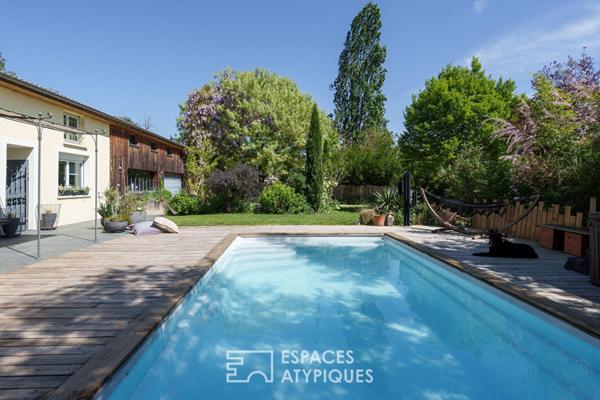 Ancien atelier réhabilité en demeure contemporaine avec piscine et volumes d’exception aux portes de Nancy