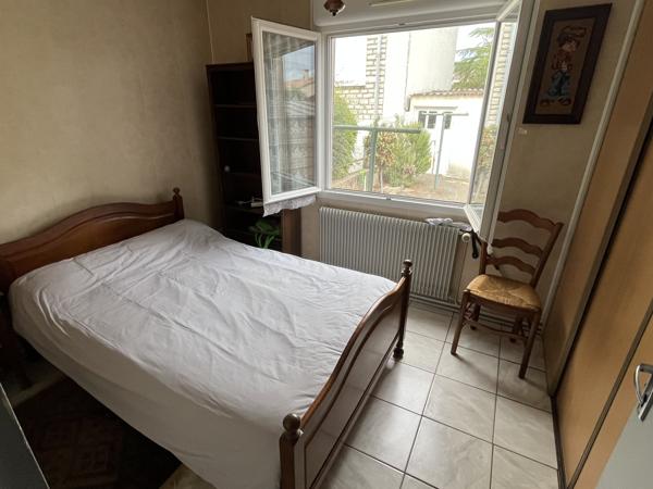 ref 113490 THOUARS proche Leclerc maison de plain pied type 3 avec garage