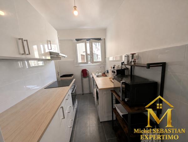 EXCLUSIVITE ! Appartement 3P rénové avec parking et cave - Centre Ville