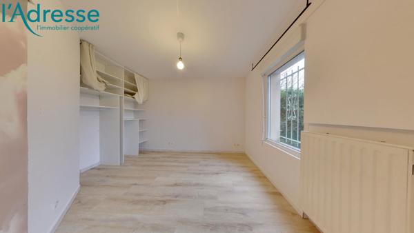 Appartement Rez-de-jardin 2 pièces avec jardin terrasse, jardin privatif et box