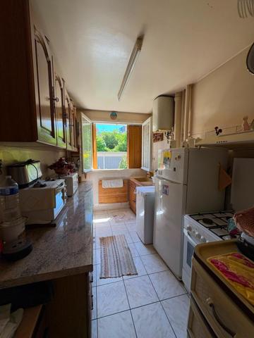 Appartement T3 + 2 CAVES + BOX FERME