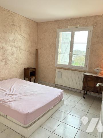 MAISON D'HABITATION EN BON ETAT AVEC SOUS-SOL ET JARDIN 