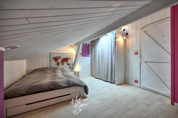 Maison de village avec jardin paysager