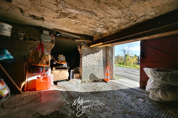 Maison de village avec jardin paysager