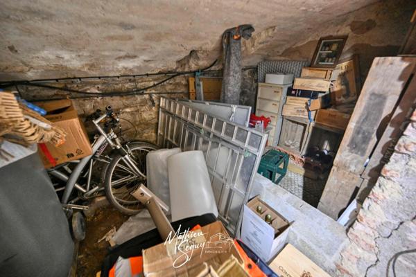 Maison de village avec jardin paysager