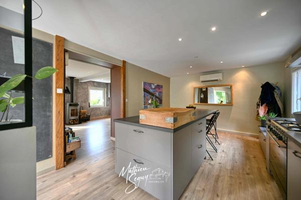 Maison de village avec jardin paysager