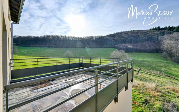 Sur les hauteurs de Thurins - Plateau de 100m² en duplex à aménager avec terrasse, 2 stationnements et 1 cave