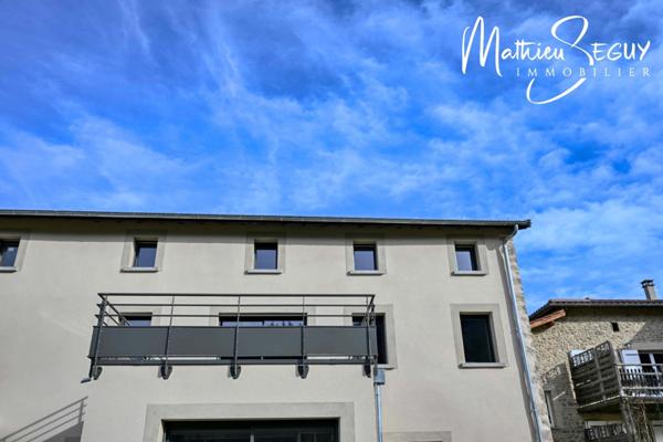 Sur les hauteurs de Thurins - Plateau de 100m² en duplex à aménager avec terrasse, 2 stationnements et 1 cave