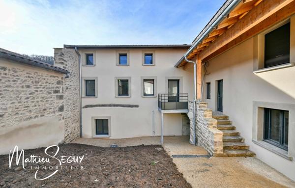 Sur les hauteurs de Thurins - Plateau de 100m² en duplex à aménager avec terrasse, 2 stationnements et 1 cave