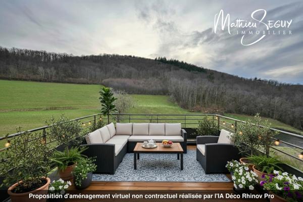 Sur les hauteurs de Thurins - Plateau de 100m² en duplex à aménager avec terrasse, 2 stationnements et 1 cave