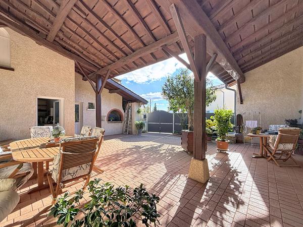 Belle maison à Meximieux de 140m² avec 5 chambres sur un jardin de 565m² avec terrasse couverte et garage