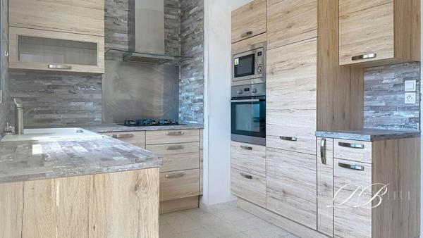 Appartement   3 pièce(s) 65 m2 avec garage et cave