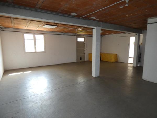 Maison T6 d'environ 113m² avec grand garage de 65m² sur une parcelle de 1374m²