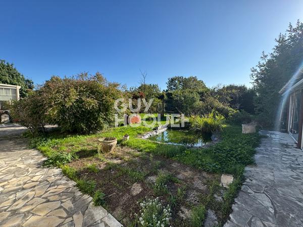 À 9 km de La Rochelle - Magnifique longère en pierre sur une parcelle de 2178m².