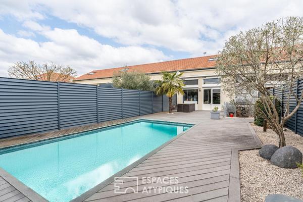 Loft de caractère avec terrasses et piscine dans une ancienne usine