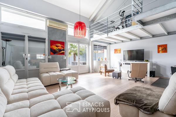 Loft de caractère avec terrasses et piscine dans une ancienne usine