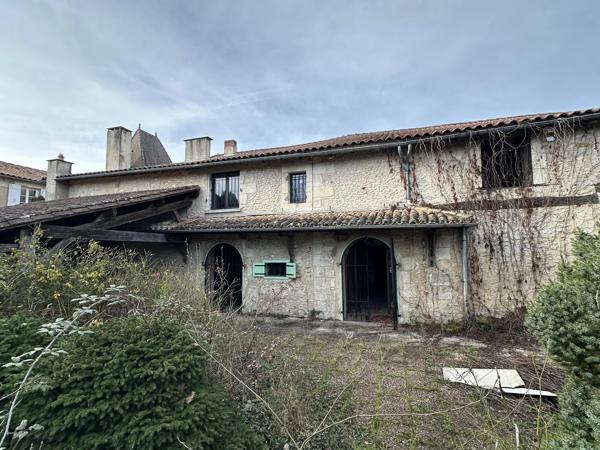Ancien commerce à vendre, avec possibilités de faire des appartements