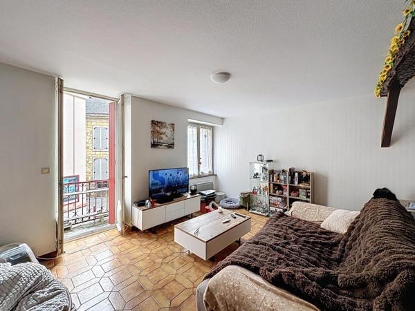 Centre-ville – Immeuble de caractère avec cachet et potentiel locatif