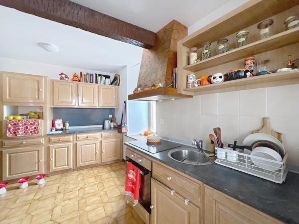 Centre-ville – Immeuble de caractère avec cachet et potentiel locatif