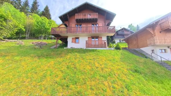 Charmant chalet familial à seulement 250 m de la télécabine – 4 chambres, terrasse ensoleillée et garage