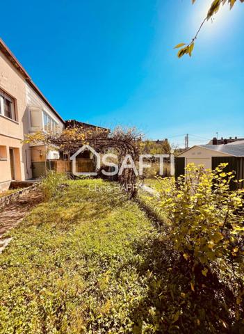 Maison mitoyenne d'environ 145m² pleine de potentiel