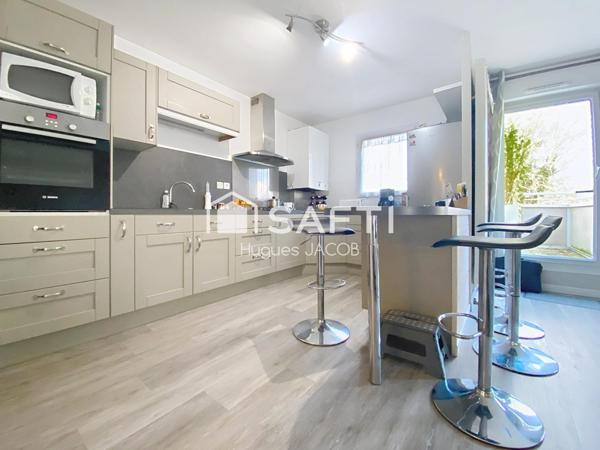 Appartement 3 pièces avec terrasse, garage et places de parking