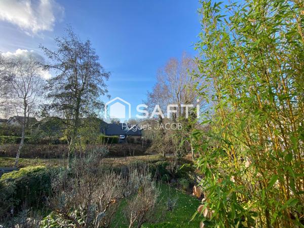 Appartement 3 pièces avec terrasse, garage et places de parking