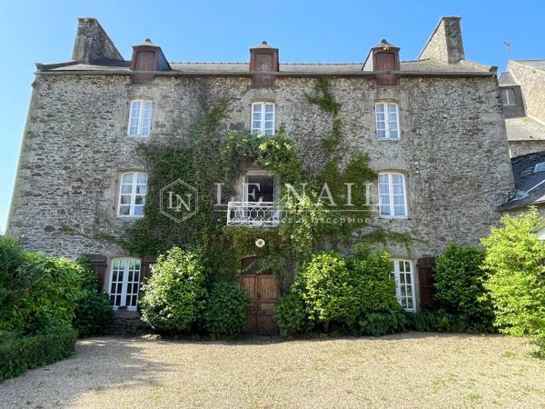 Maison de maître du XIXe siècle avec son jardin et son local commercial