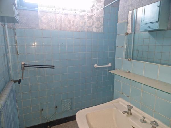 Charmante maison sur sous sol avec terrain,