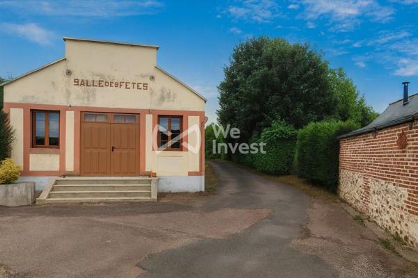 Maison familiale de plus de plus de 215 m² avec salle des fêtes et dépendances.