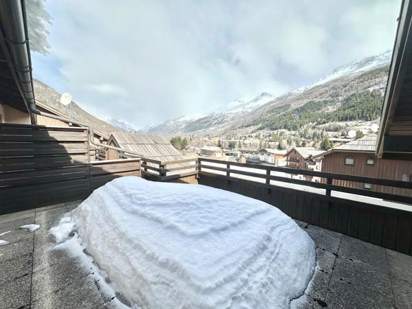 Duplex avec terrasses/cave, place de parking en sus