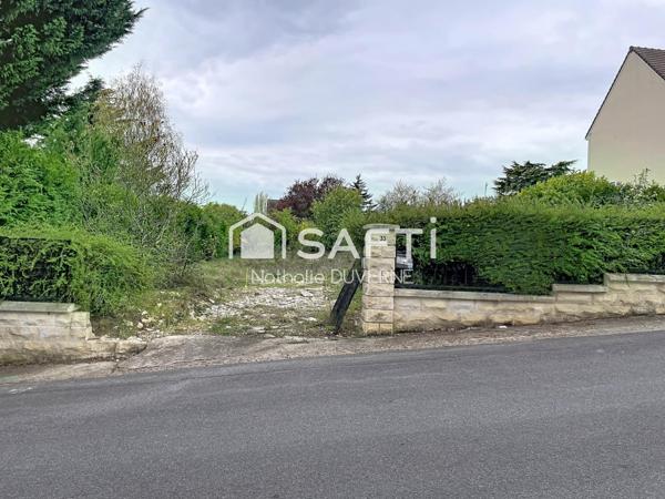 Terrain en 2 lots de 462 m2 chacun - REC C - proche commerces - écoles - quartier résidentiel